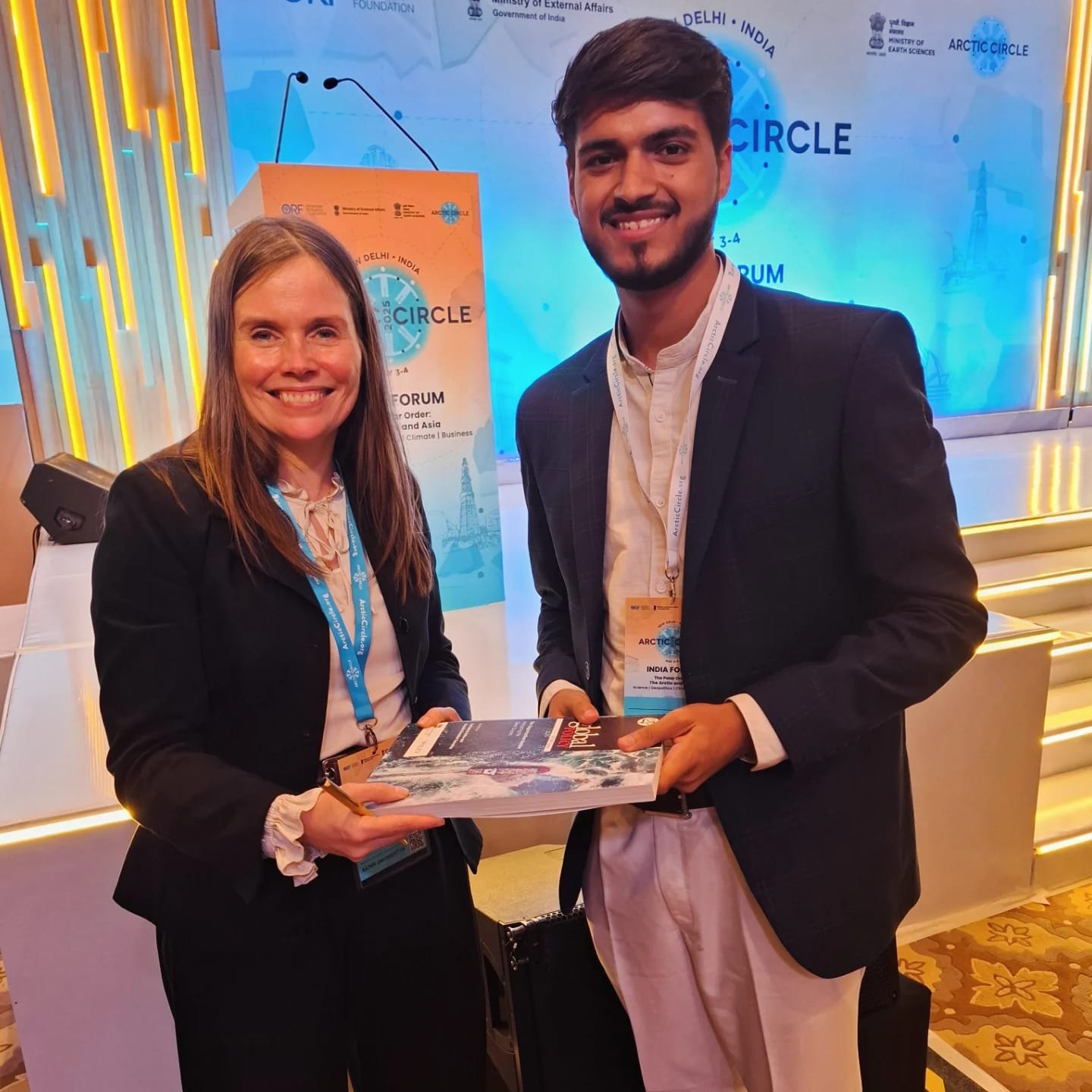 Akshat Mehrotra with the Prime Minister of Iceland during a book signing.